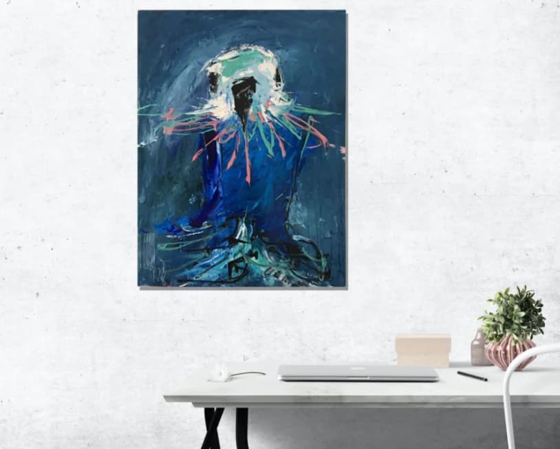 Pretty Boy II: blue budgerigar painting with pink accents hanging above a white desk mockup. Original painting by Kim Kennedy.