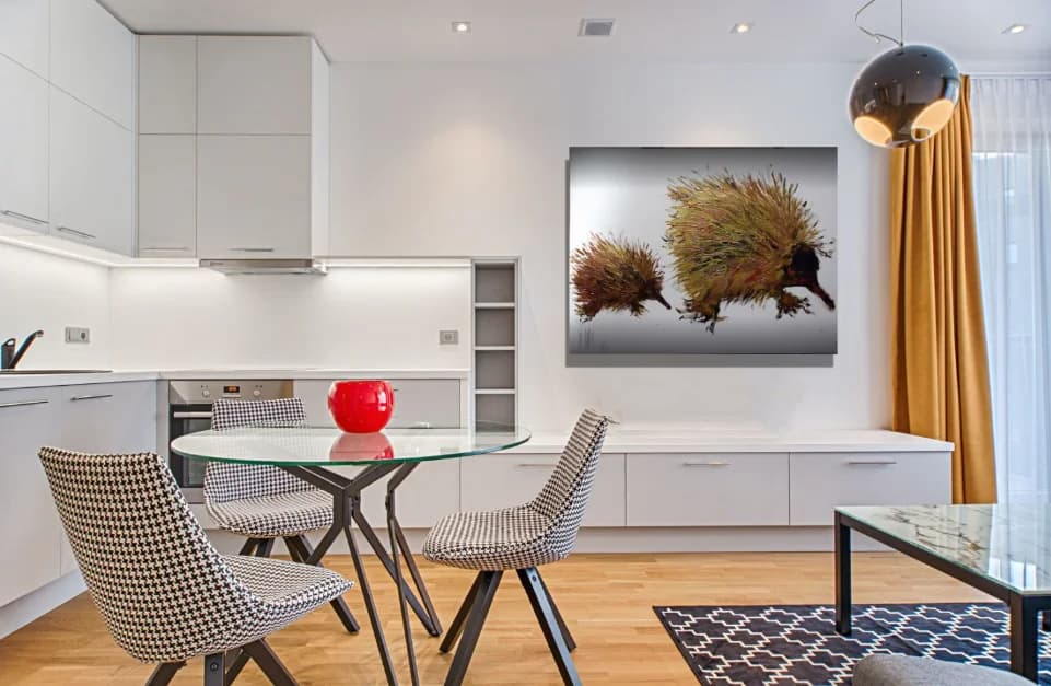 The Long Walk: two golden spiky echidnas painting on grey backdrop, hung in white kitchen mockup. Original painting by Kim Kennedy.