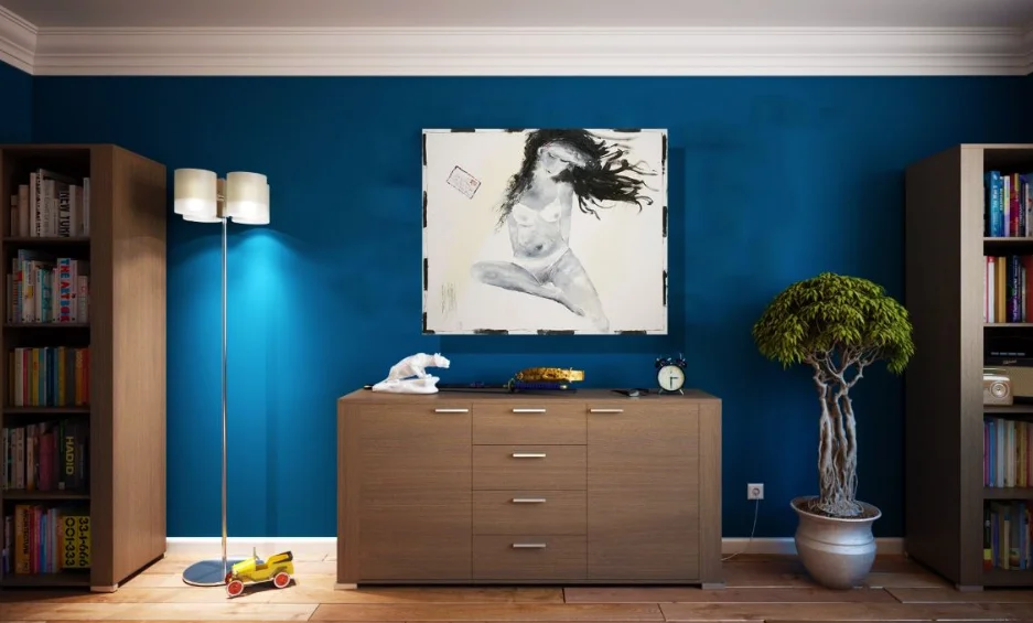 Deep in thought: monochrome seated woman with flowing black hair on white canvas, blue lounge wall. Original painting by Kim Kennedy.