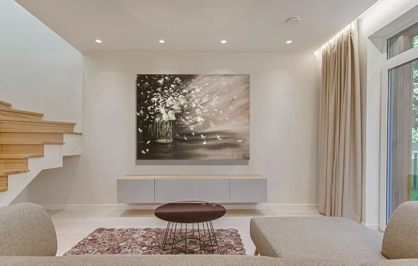 Spring Bunch: white blossoms scattering from glass vase on sepia ground, in styled lounge. Original painting by Kim Kennedy.