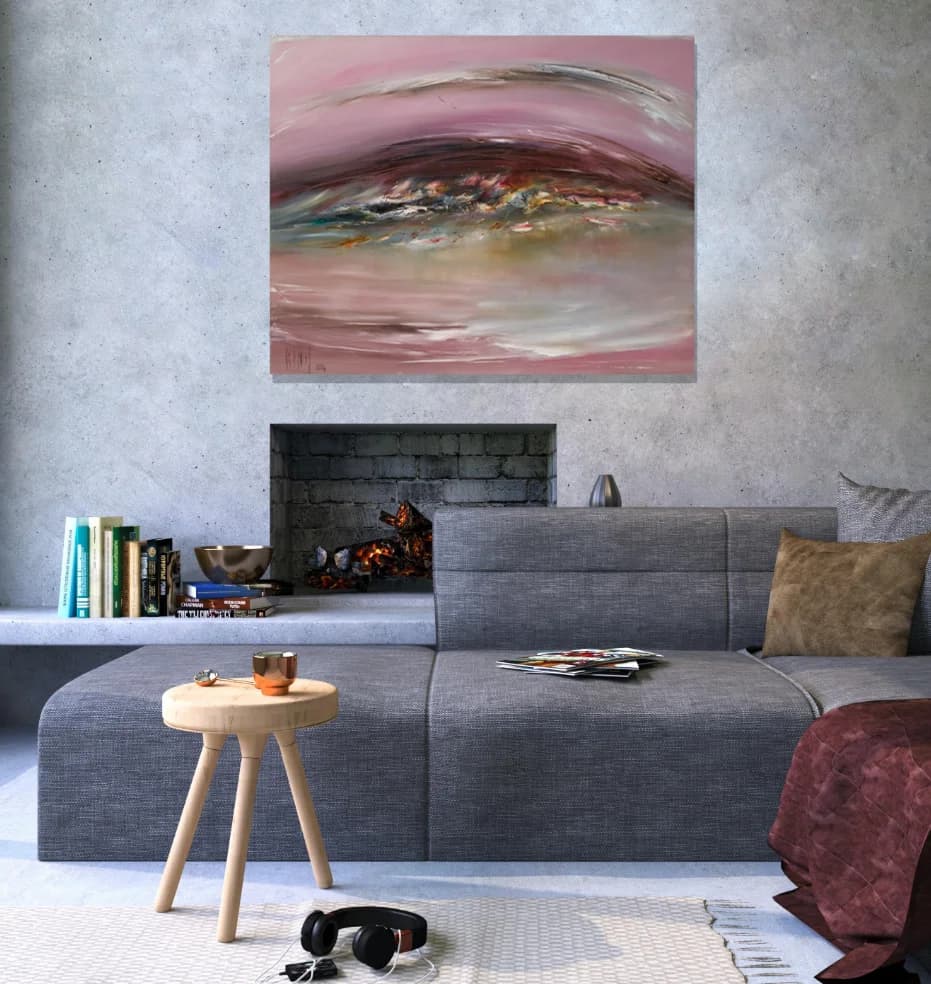 Grass Fire: dusky pink abstract landscape sweep above grey lounge sofa. Original painting by Kim Kennedy.